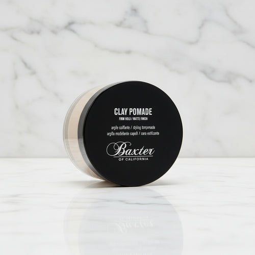 Baxter of California clay pomade container on a white background