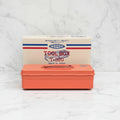 Orange toolbox with a white box featuring 'Toyo' branding on a light gray surface.