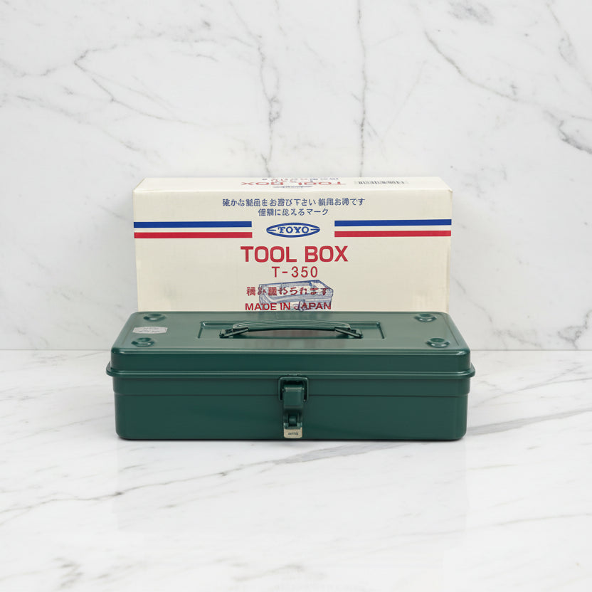 Green tool box with a white box labeled 'TOYO TOOL BOX T-350 MADE IN JAPAN' on a white background