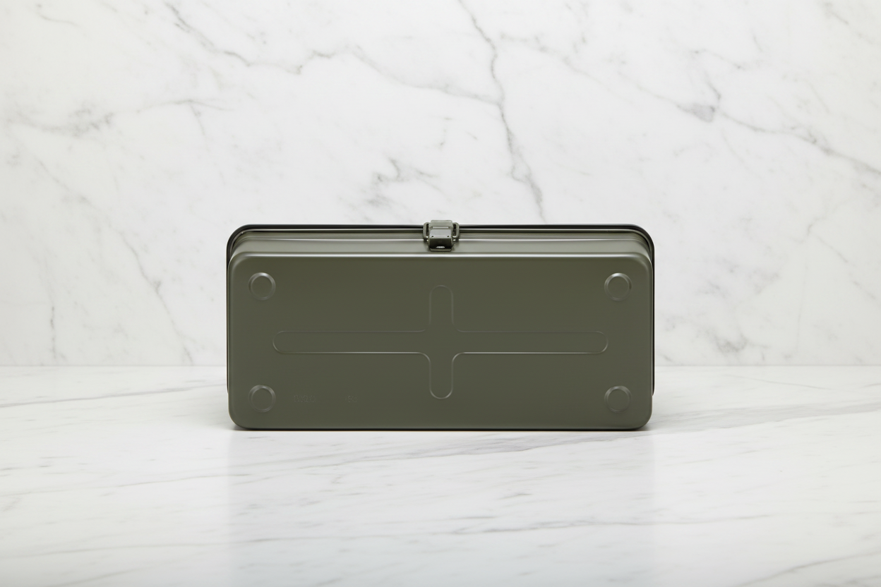 Green metal took box on a gray background