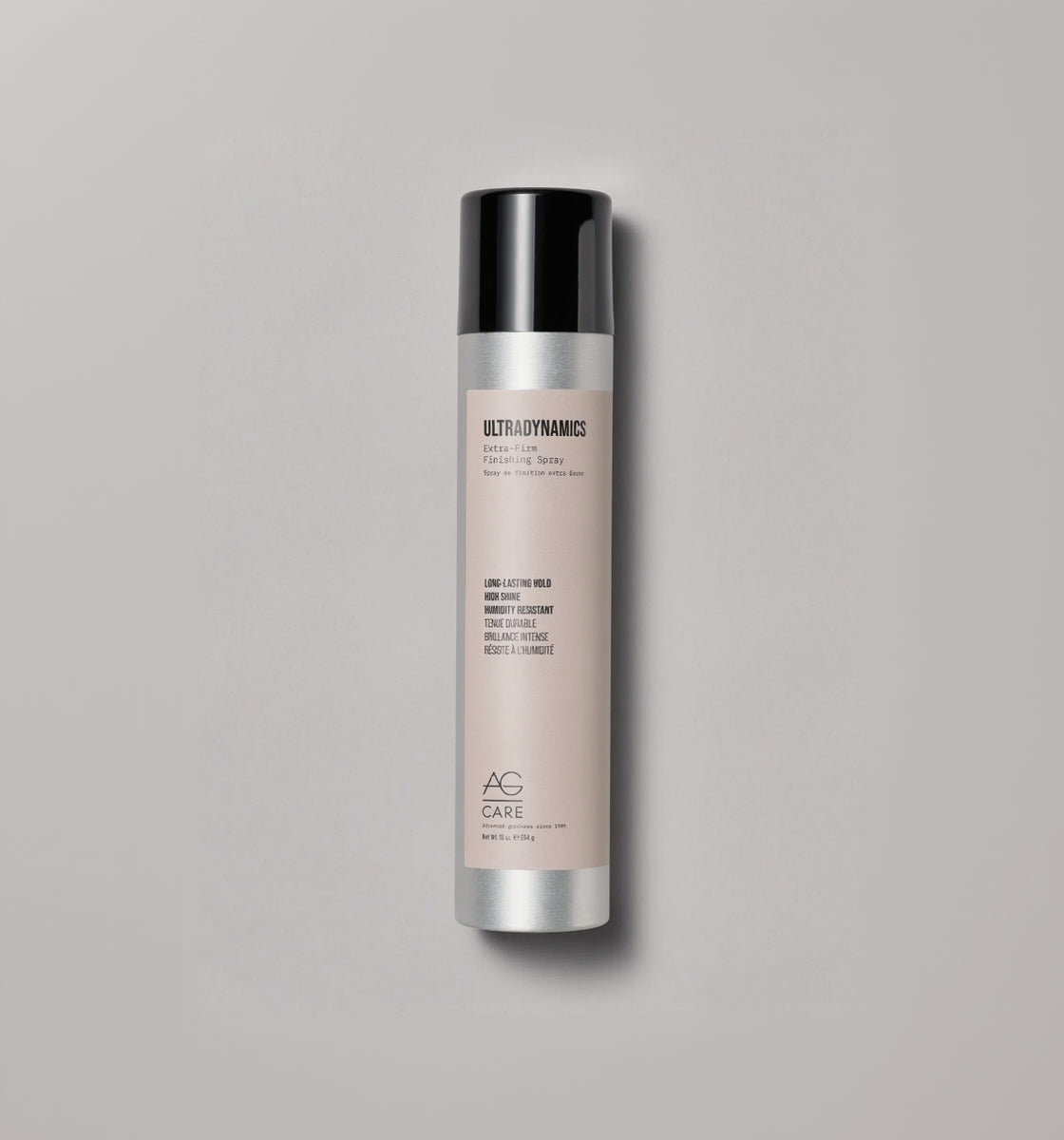 Ultradynamics hair care product bottle on a gray background